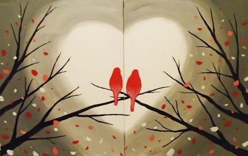 Two red birds sit on tree branches with falling red and white leaves. A large white heart shape is formed in the background by the branches and lighting. The overall scene feels romantic and artistic. This is the project for the February Paint and Sip event.